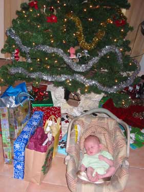 Andy surrounded by the gifts